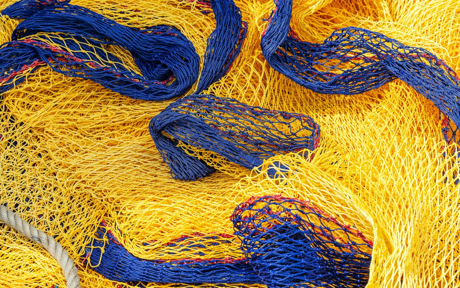 Real close-up photo of fishing nets prepared for netting supply